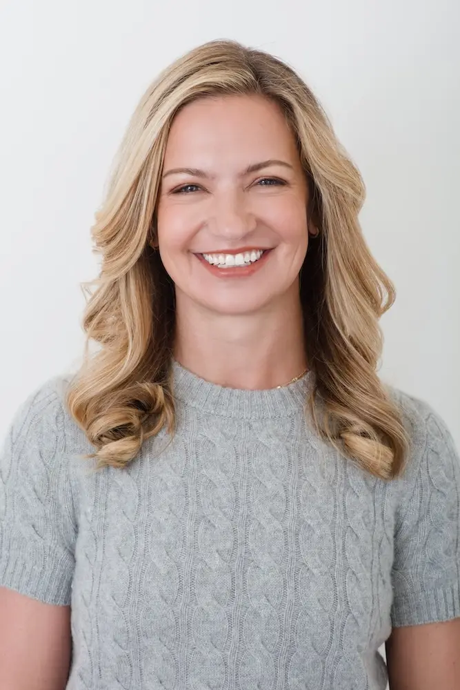 Professional headshot of Mary Miele, founder of Evolved.