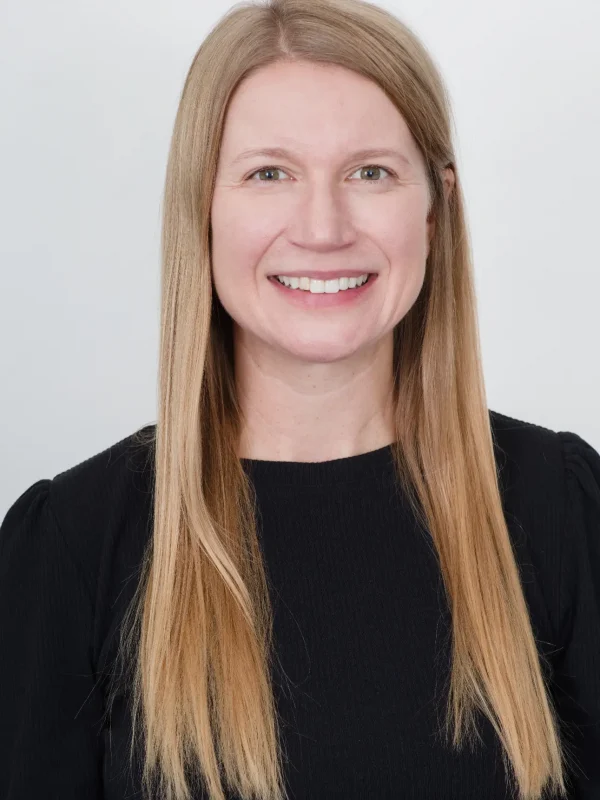 Professional headshot of Julia Calantone, Education Consultant for Evolved.